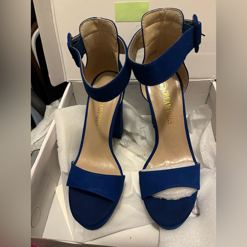 Royal blue suede beautiful heels new only tried on.Heel is 4.5 inches w platform